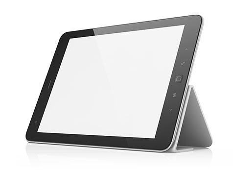 Tablet computer on stand with blank screen