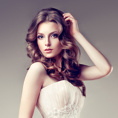 Brunette woman in white strapless dress