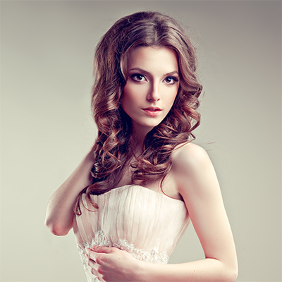 Brunette woman in strapless white dress