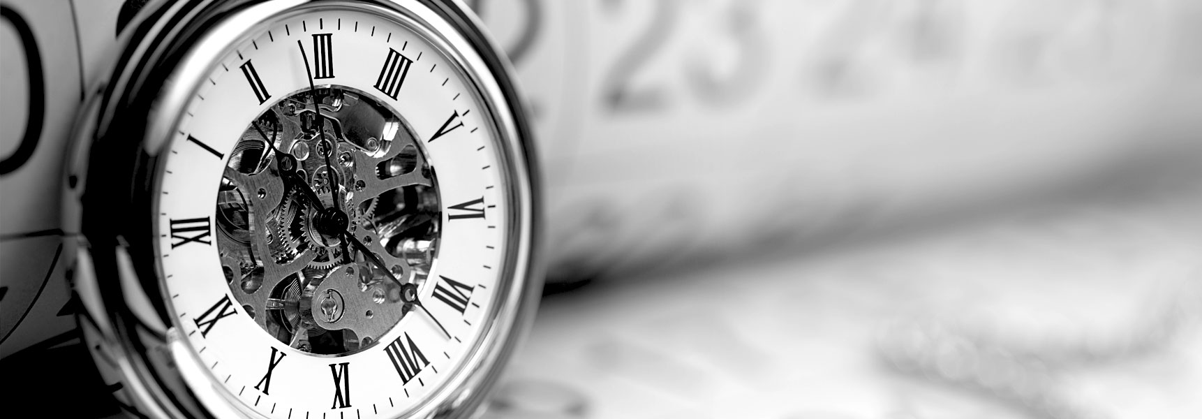 Close-up mechanical pocket watch with visible gears